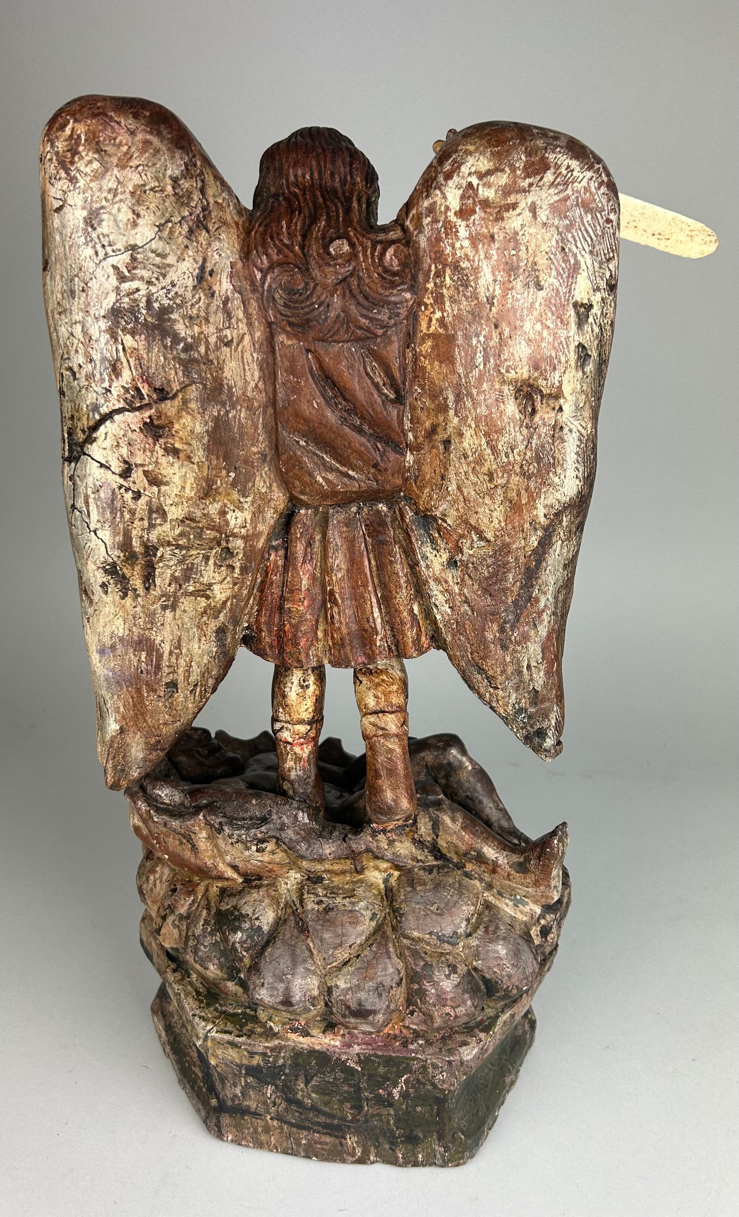 A OAK CARVED FIGURE OF ST MICHAEL SLAYING THE DEVIL, With bone sword and horns. Probably 19th - Image 4 of 5