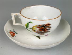 AN 18TH OR 19TH CENTURY MEISSEN TEA CUP AND SAUCER, Likely not matching.