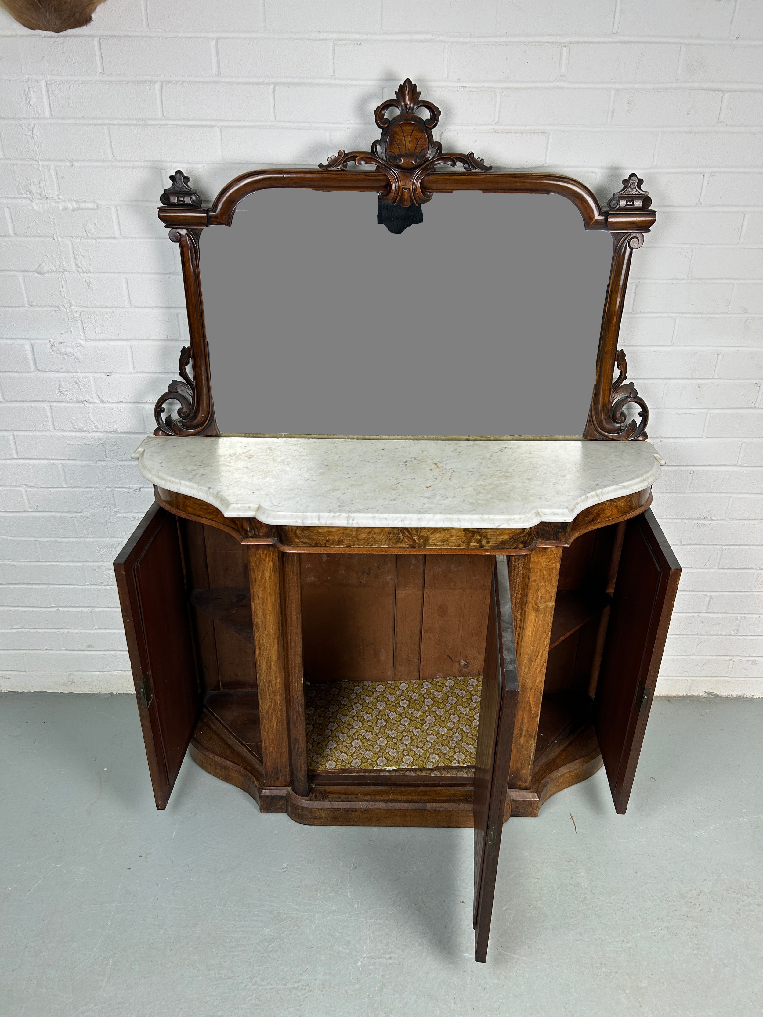 A 19TH CENTURY MAHOGANY WALNUT CREDENZA WITH WHITE MARBLE TOP, The mirrored back with carved central - Image 2 of 2