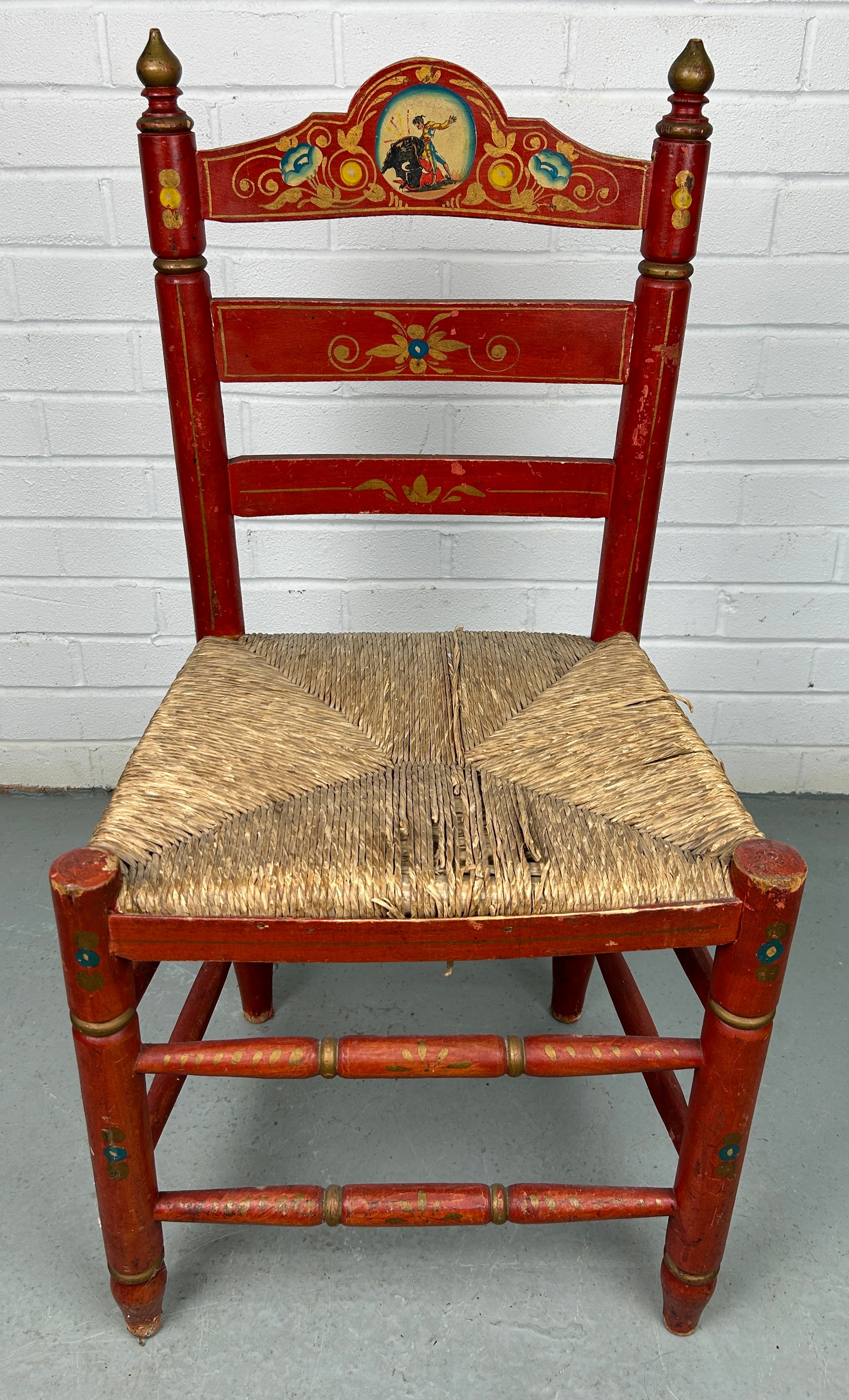 A RED SPANISH CHAIR WITH RUSH SEAT PAINTED WITH SCENE OF A MATADOR, 90cm x 40cm x 35cm - Image 2 of 5