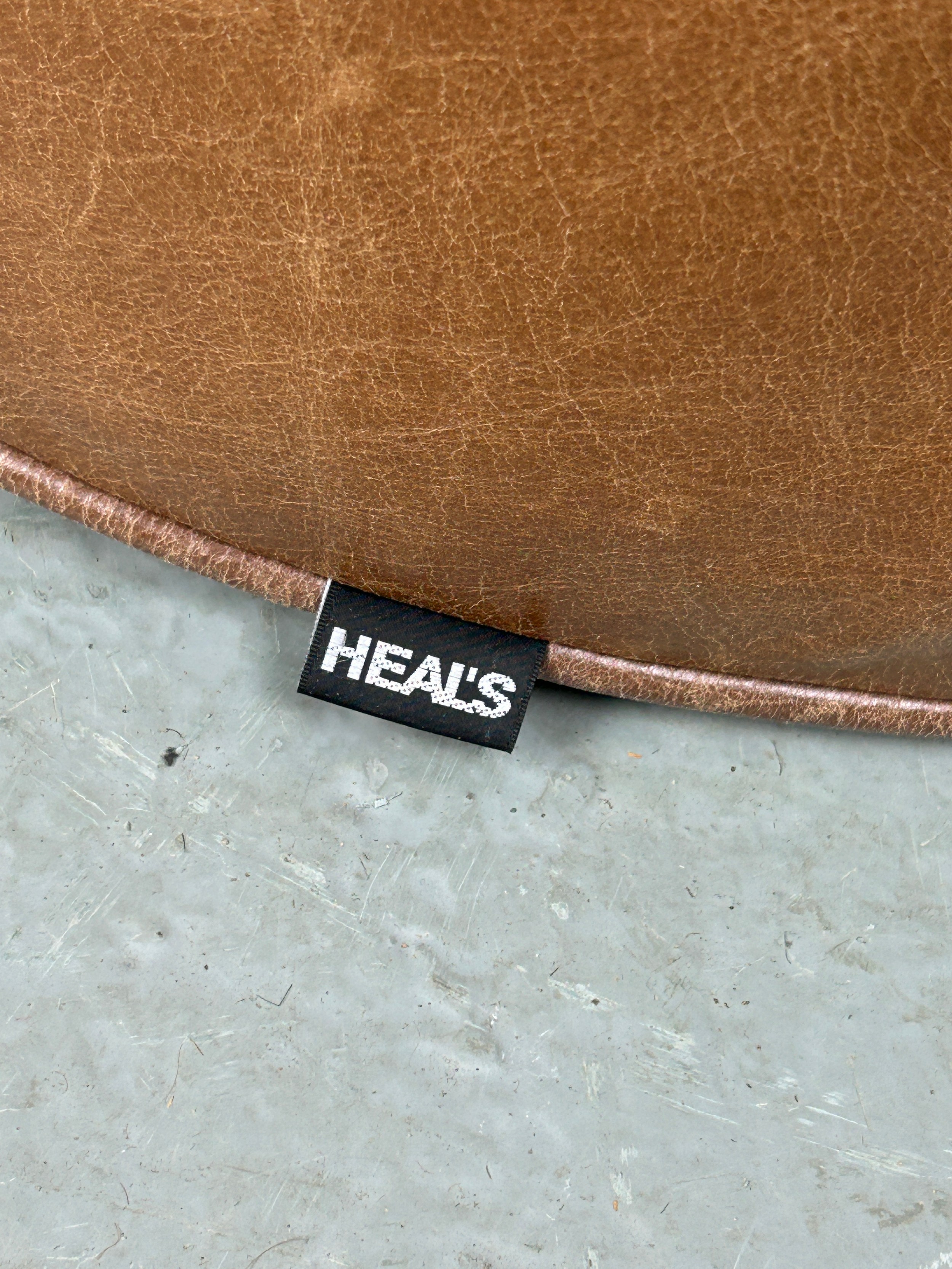 A PAIR OF HEALS CIRCULAR STOOLS OR POUFFES UPHOLSTERED IN TAN LEATHER, 60cm x 35cm each. - Image 3 of 3