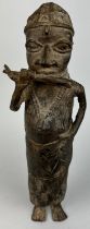 A NIGERIAN BENIN HEAVY BRONZE DEPICTING A SOLDIER, 20th century.