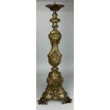 A HEAVY BRASS ECCLESIASTICAL PRICKET CANDLESTICK, European probably 19th Century, with gilded