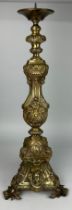 A HEAVY BRASS ECCLESIASTICAL PRICKET CANDLESTICK, European probably 19th Century, with gilded