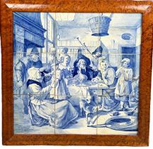 AFTER JAN STEEN: A SET OF NINE DELFT TILES DEPICTING A DOMESTIC SCENE, Mounted in a walnut frame.
