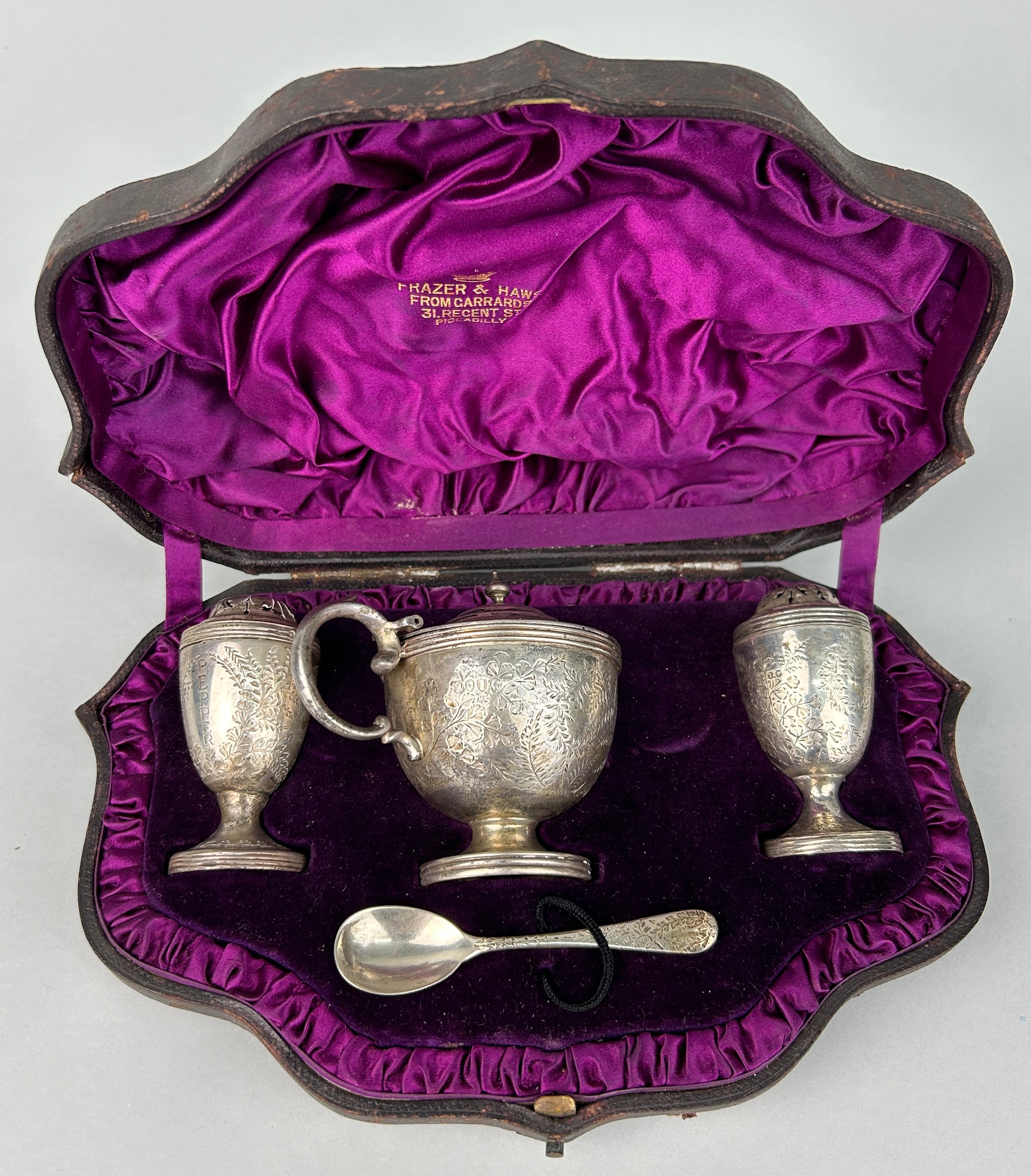 A SILVER SALT SET BY FRASER AND HAWS RETAILED BY GARRARD AND CO IN ORIGINAL CASE, Total weight