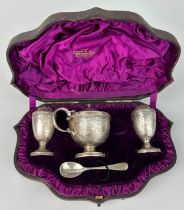 A SILVER SALT SET BY FRASER AND HAWS RETAILED BY GARRARD AND CO IN ORIGINAL CASE, Total weight