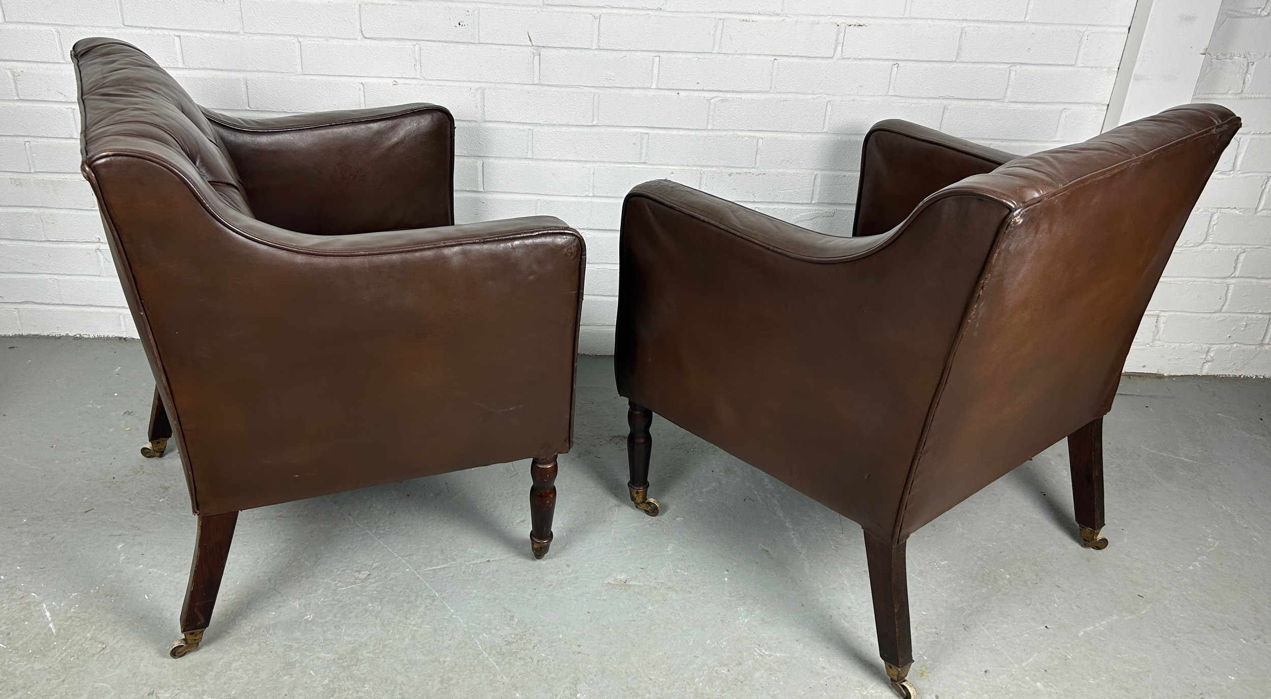 A PAIR OF BROWN LEATHER BUTTON BACK CLUB CHAIRS, Removed from Brown's Club London. Each raised on - Image 5 of 5