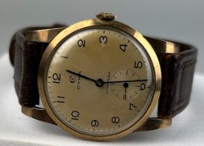 A CYMA CYMAFLEX ROLLED GOLD GENTLEMAN'S WRISTWATCH, With brown leather strap.