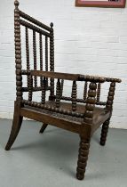 A BOBBIN TURNED ARMCHAIR ON FOUR LEGS, 106cm x 65cm x 65cm