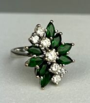 AN 18CT WHITE GOLD RING SET WITH DIAMONDS AND EMERALDS, 7.48gms