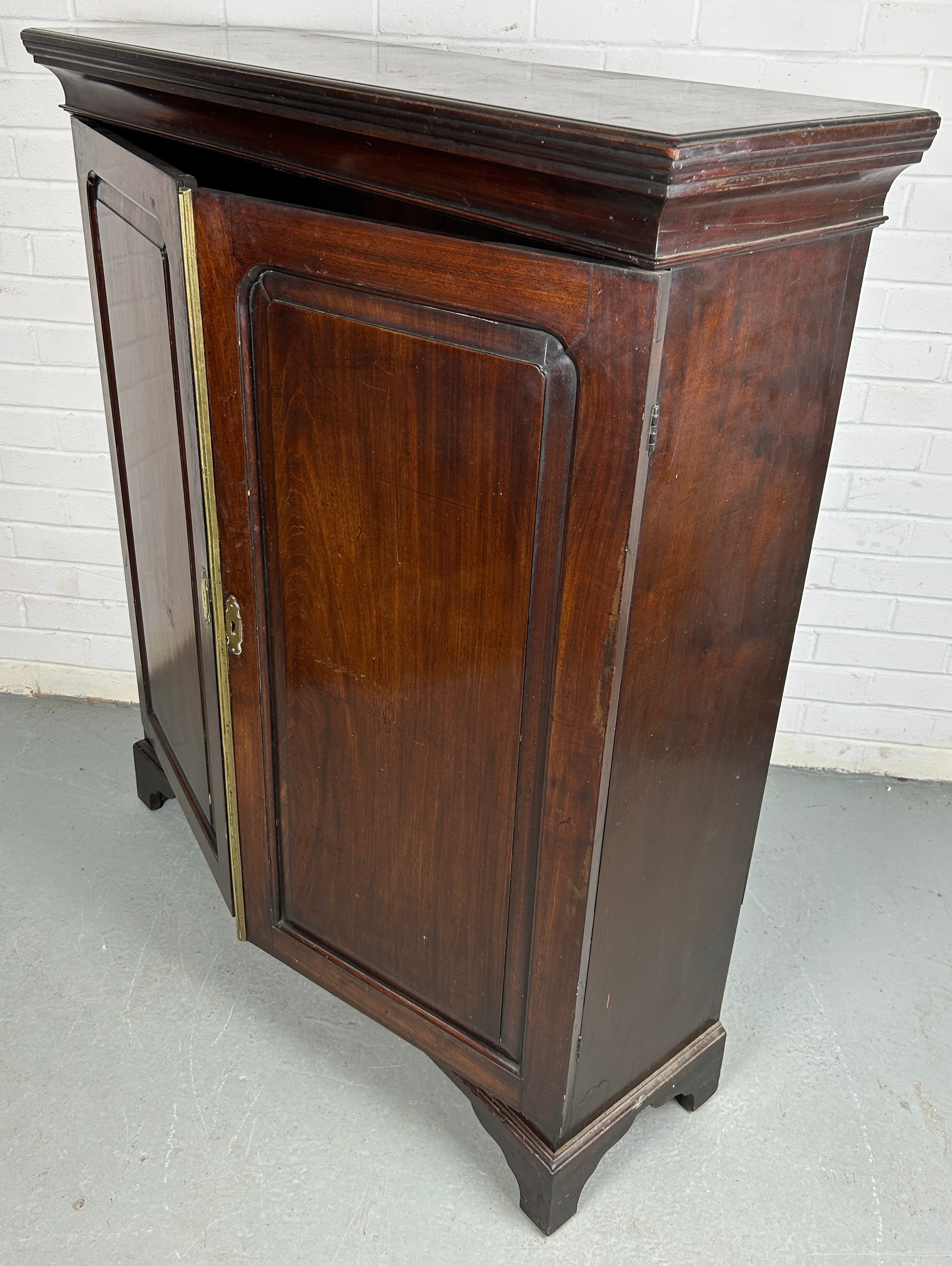 A 19TH CENTURY CABINET, Two doors with bracket feet, brass escutcheons. 120cm x 105cm x 34cm - Image 3 of 3