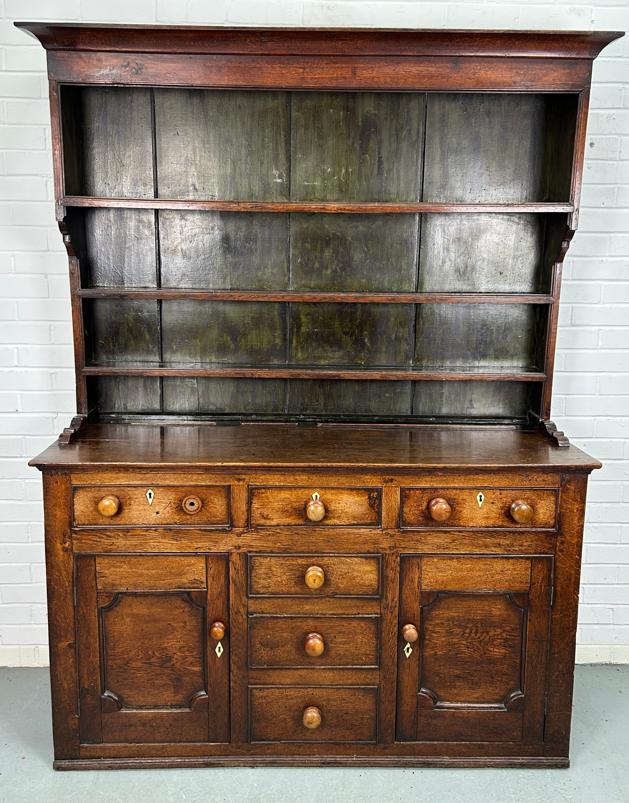 A LARGE 19TH CENTURY OAK DRESSER, 200cm 150cm x 48cm The shelved top above the base with three