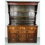 A LARGE 19TH CENTURY OAK DRESSER, 200cm 150cm x 48cm The shelved top above the base with three