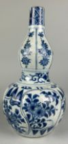 A CHINESE MING DYNASTY WANLI PERIOD (1572-1620) DOUBLE GOURD VASE, Decorated with flowers. Damage to