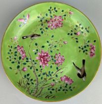 A CHINESE DISH GREEN ENAMELLED WITH MAGPIES AND FLOWERS GUANGXU SIX CHARACTER MARK (1875-1908)