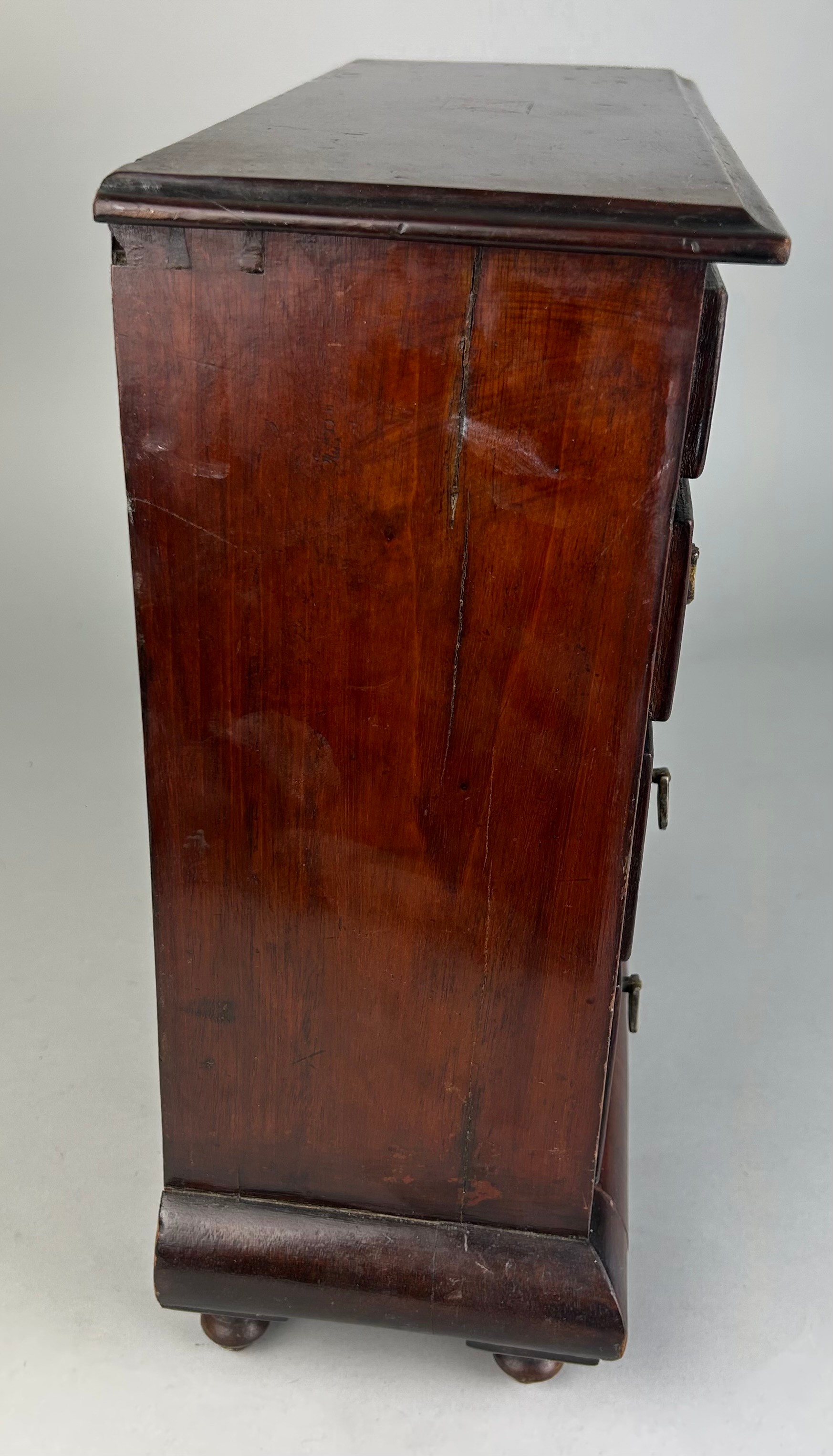 AN EARLY 19TH CENTURY APPRENTICE CHEST OF DRAWERS, With parquetry inlay raised on turned feet. - Image 3 of 5