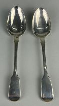 A PAIR OF VICTORIAN SILVER SERVING SPOONS MARKED MVNB, Total weight: 140gms