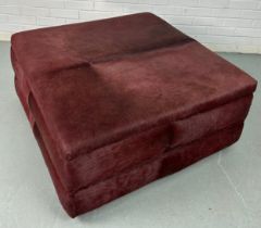 A COW HIDE UPHOLSTERED SQUARE CENTRE STOOL OR POUFFE, 93cm x 93cm x 43cm