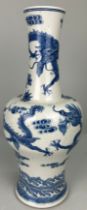 A LARGE BLUE AND WHITE CHINESE VASE WITH A FOUR CLAW DRAGON CHASING THE FLAMING PEARL, 45cm h 19th