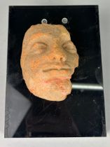 AFTER THE ANTIQUE: A CLASSICAL TERRACOTTA BUST OF A MAN, On stand. Old repairs. 10cm x 8cm