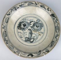 A BLUE AND WHITE CERAMIC DISH DECORATED WITH FLOWERS, Probably Vietnamese or Thai, 18th century or