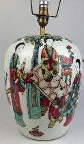 A CHINESE PORCELAIN VASE IN THE FORM OF A LAMP REPUBLIC PERIOD, Decorated with various figures.