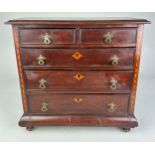 AN EARLY 19TH CENTURY APPRENTICE CHEST OF DRAWERS, With parquetry inlay raised on turned feet.