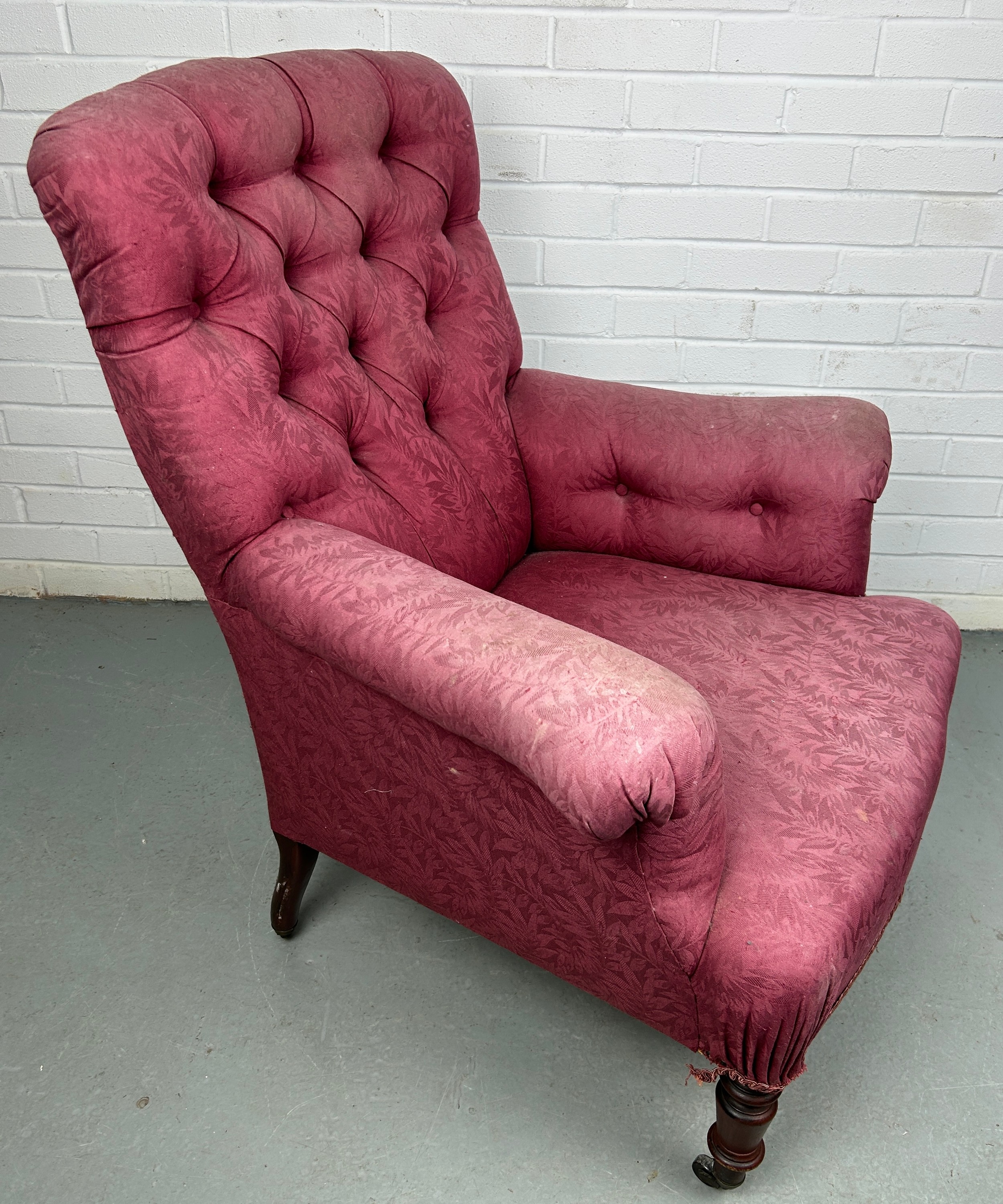 A VICTORIAN BUTTON BACK ARMCHAIR IN THE MANNER OF HOWARD AND SONS, Upholstered in raspberry coloured - Image 4 of 5