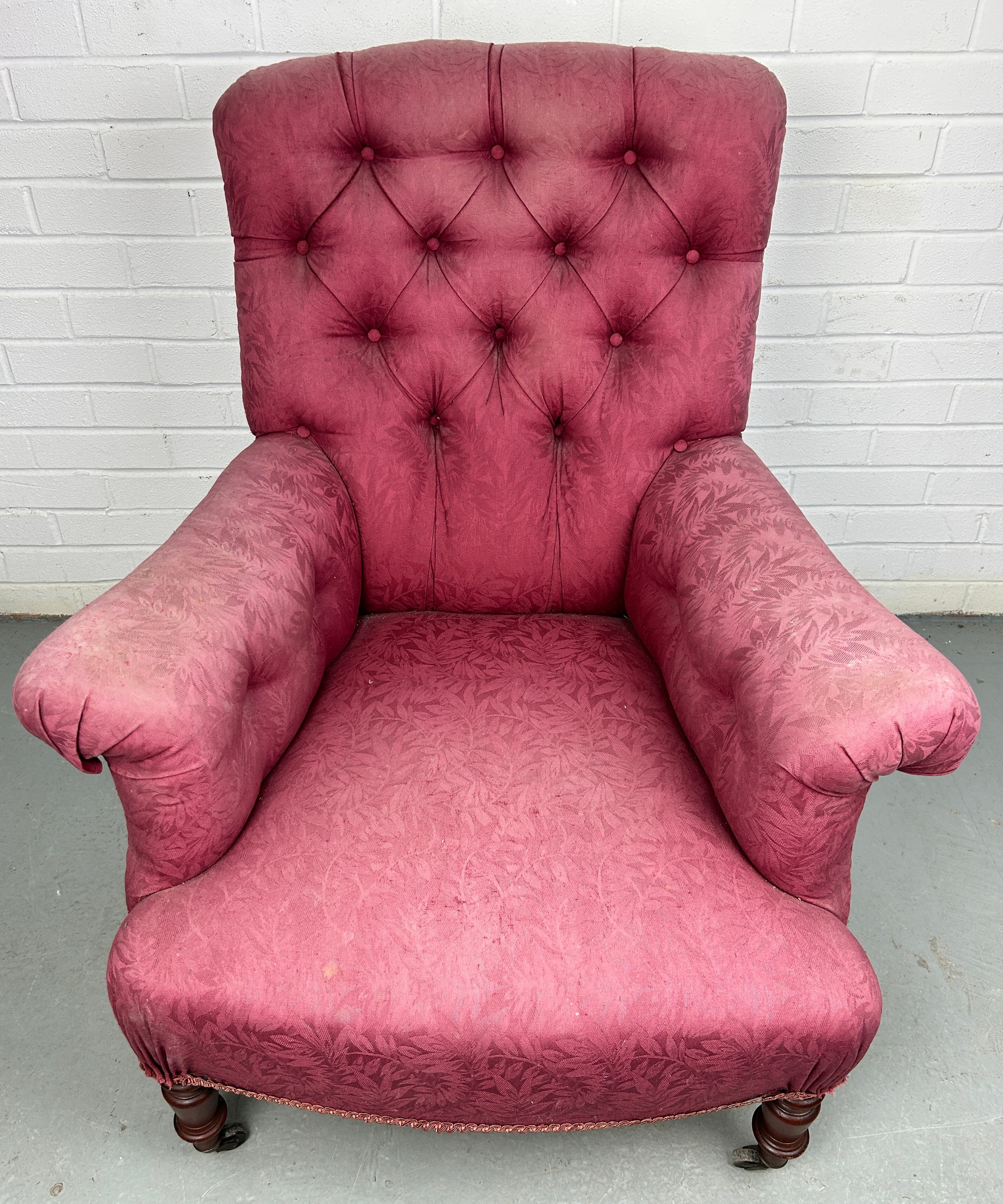 A VICTORIAN BUTTON BACK ARMCHAIR IN THE MANNER OF HOWARD AND SONS, Upholstered in raspberry coloured - Image 3 of 5