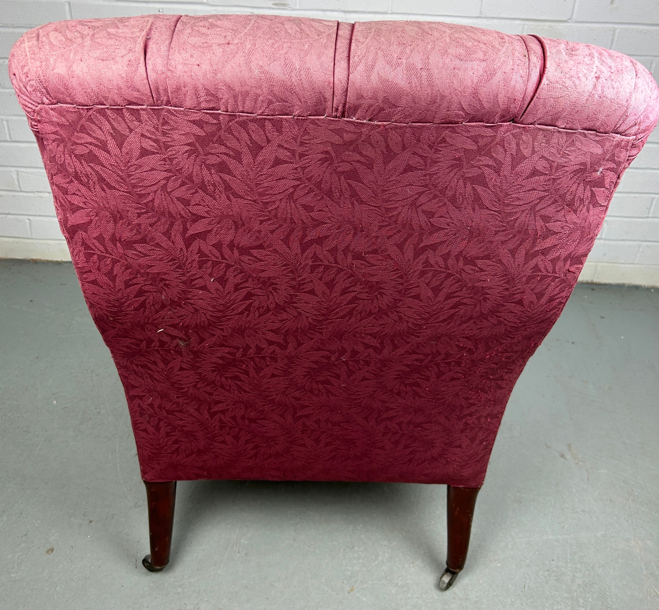 A VICTORIAN BUTTON BACK ARMCHAIR IN THE MANNER OF HOWARD AND SONS, Upholstered in raspberry coloured - Image 5 of 5
