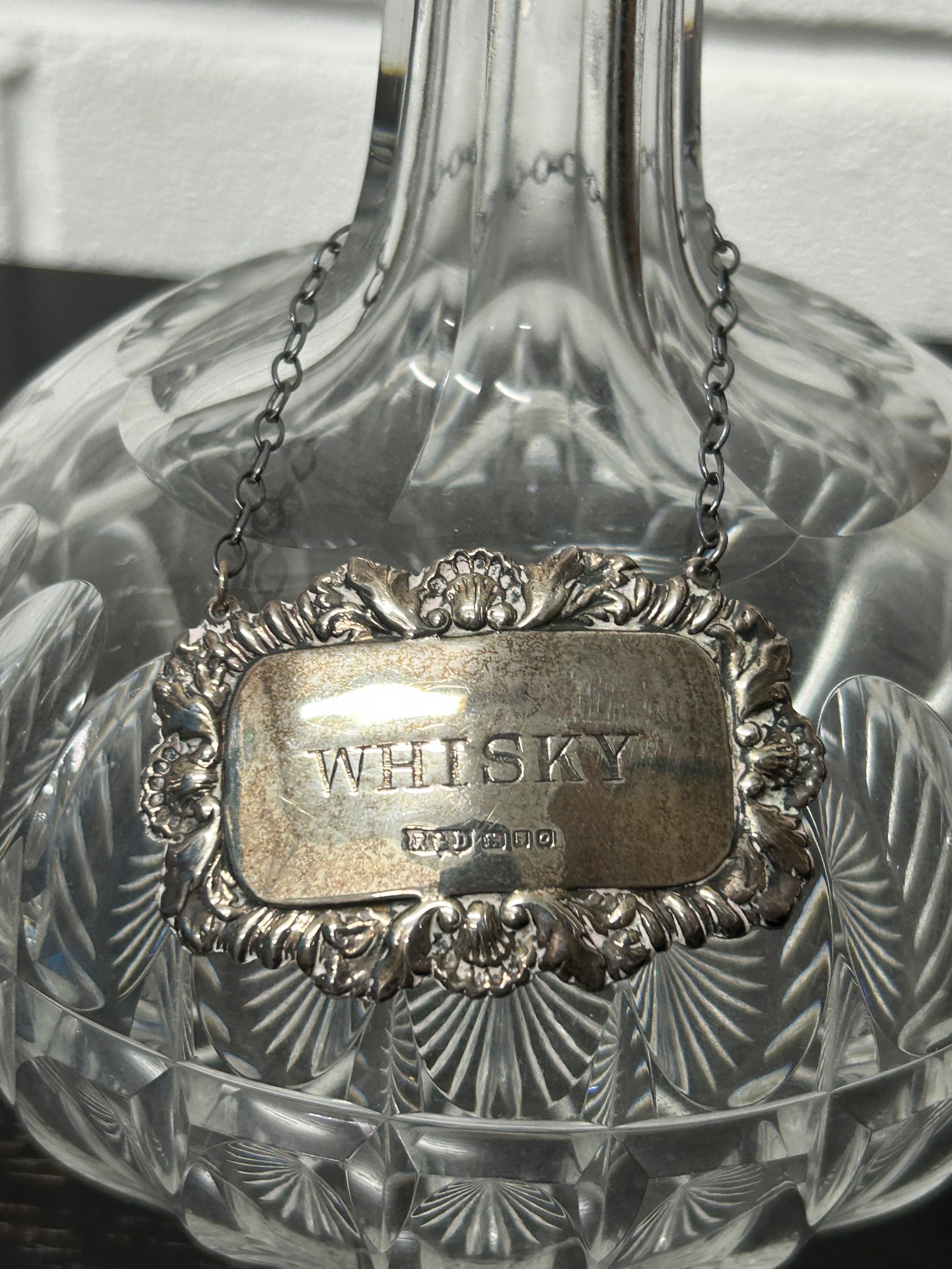 A NEAR PAIR OF GLASS DECANTERS, one with silver sherry label (2) - Image 2 of 2