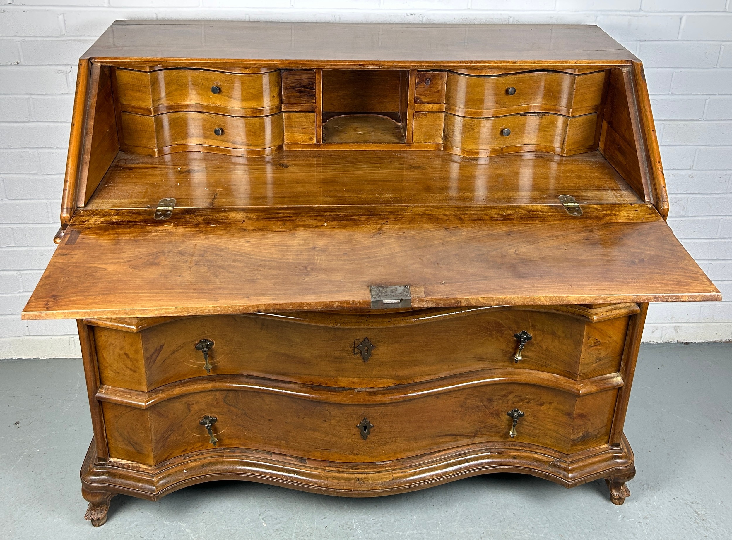 A CONTINENTAL WALNUT SERPENTINE BUREAU, 116cm x 108cm x 58cm Early 20th century, with fall front - Image 2 of 13