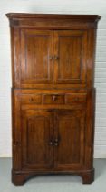 A LARGE CONTINENTAL LATE 18TH CENTURY OR EARLY 19TH CENTURY CORNER CABINET, The top cupboard with