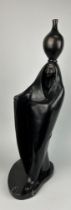 ANNE ROONEY (AMERICAN 20TH CENTURY) SCULPTURE OF A LADY WITH AN URN ON HER HEAD, Mounted on a
