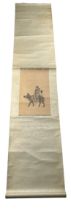 A CHINESE SCROLL PAINTED WITH A MAN RIDING A MULE, 228cm L x 46cm W