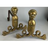 A PAIR OF 19TH CENTURY BRASS FIREDOGS DEPICTING A MALE FIGURE OF A SEA GOD