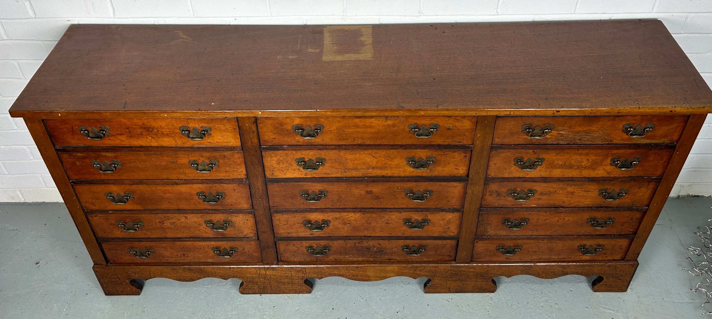 A 19TH CENTURY BANK OF FIFTEEN DRAWERS, 170cm x 81cm x 38cm Each drawer with two brass bat wing - Image 5 of 11