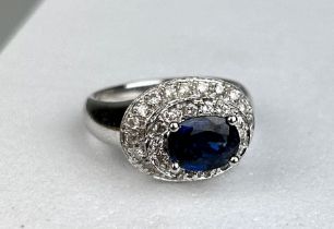 A 14CT WHITE GOLD RING SET WITH A SAPPHIRE, 6.8gms