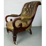 A VICTORIAN LIBRARY GREEN LEATHER UPHOLSTERED SLIPPER ARMCHAIR, Raised on four legs and castors.