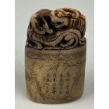 A 19TH CENTURY CHINESE SOAPSTONME SEAL WITH A LION AND CALLIGRAPHY, 7.5cm x 4.5cm x 2.3cm