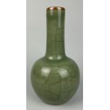 A 19TH CENTURY CHINESE CELADON CRACKLE GLAZED GLOBULAR BOTTLE VASE, 24cm H