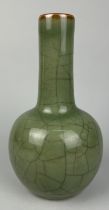 A 19TH CENTURY CHINESE CELADON CRACKLE GLAZED GLOBULAR BOTTLE VASE, 24cm H