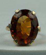 A ORANGE STONE POSSIBLY CITRINE OR TOPAZ IN 9CT, Weight: 8.1gms Stone 22mm x 18mm