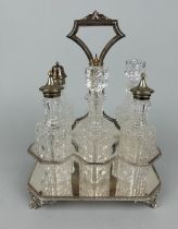 A CUT GLASS CRUET SET WITH SILVER PLATED TOPS AND STAND,