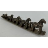 A CHINESE METAL STAND WITH FIVE HORSES OF GRADUATING SIZE, Stand 24cm Largest horse 6cm x 5.5cm