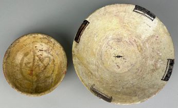 TWO IRANIAN NISHAPUR BOWLS POSSIBLY 9TH / 10TH CENTURY, The smaller one with writing to interior and