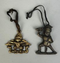 TWO TIBETAN PENDANTS, Largest 6cm x 4cm