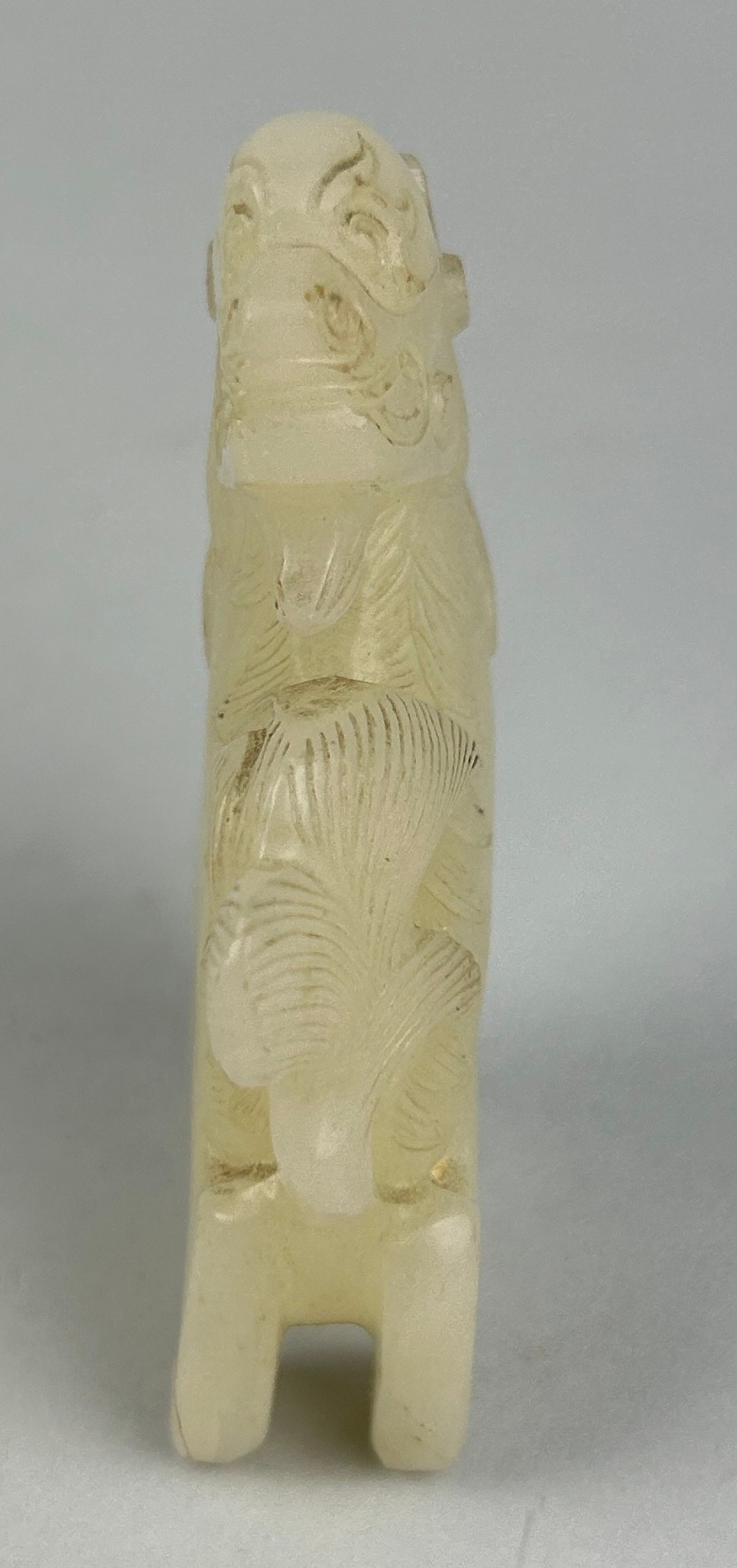 AN EARLY 19TH CENTURY CHINESE WHITE JADE GROUP OF A LION, 7.5cm x 4.7cm x 1.8cm - Image 3 of 4