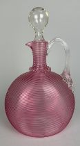 A MID CENTURY MURANO PINK RIBBED DECANTER WITH STOPPER,